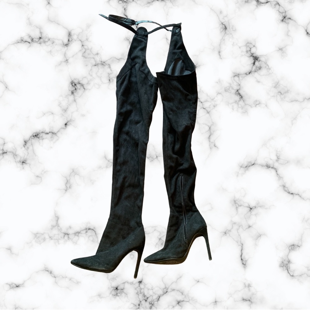 Waist high heeled boots